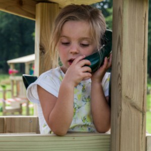 The green phone on the playset rings when the buttons are pressed