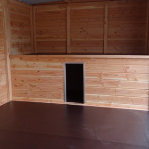 Dog kennel with integrated and insulated doghouse