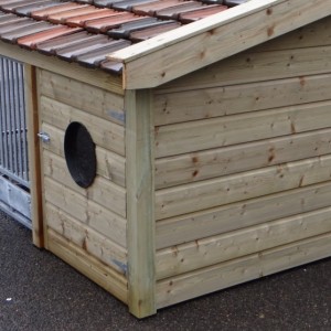 The dog kennel is provided with 2 sleeping compartments