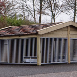 The large dog kennel Rex 2 is divided in 2 parts