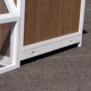 Wooden chicken coop with tray
