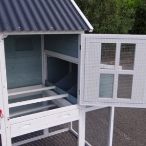 The sleeping compartment of rabbit hutch Alexia has a large door