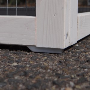 The Jason rabbit hutch stands on rubber feet, preventing moisture from seeping in directly