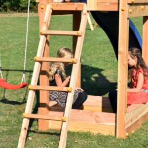 Play equipment Kiosk low offers place for a sandbox