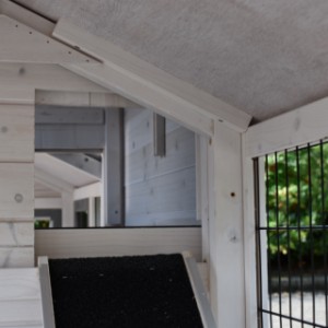 The opening to the upper sleeping compartment of rabbit hutch Double Small