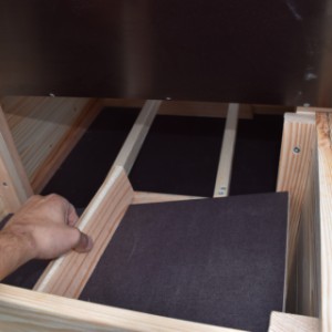 The laying nest of chickencoop Flex 3.1 has a removable floor