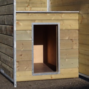The dog kennel is provided with an insulated sleeping compartment
