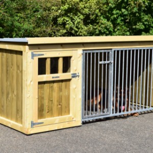 The wooden kennel is made of impregnated spruce wood