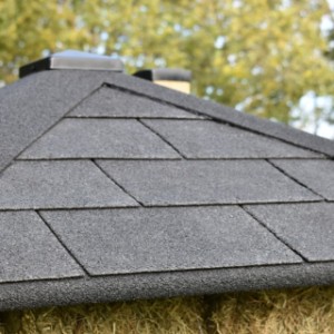 The roof is provided with black roof shingles