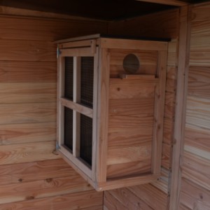 The aviary is provided with a sleeping compartment