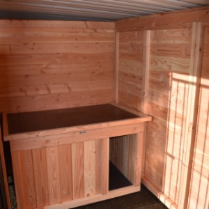 The dog kennel is provided with a dog house Block Large