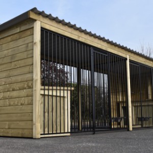 The beautiful dog kennel is made of impregnated wood