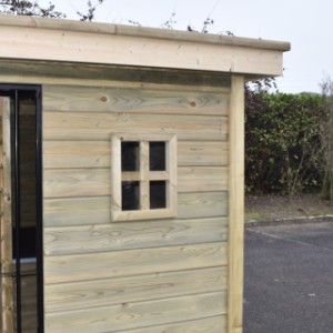 The wooden dog kennel Modul FORZ is provided with a window