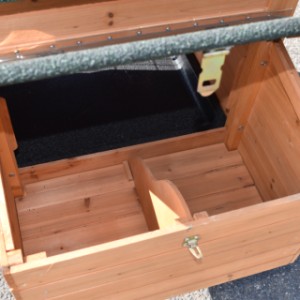 The laying nest of the Prestige Small chicken coop is divided into two sections