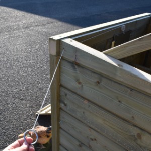 The Chicky chicken coop can be opened and closed from the outside