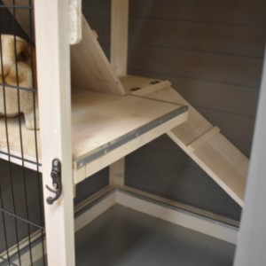 The wooden hutch is provided with aluminum chewprotection
