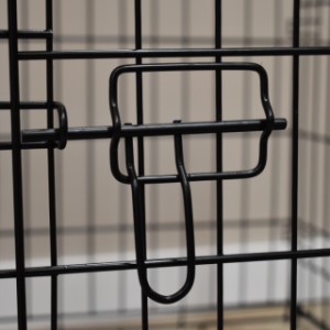 The dog crate has 2 locks per door