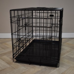 This dog crate is intended for smaller dog breeds, such as the French Bulldog