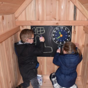 The Dream playhouse has space for a chalkboard