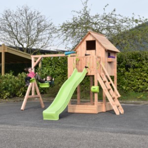 Playhouse Dream is extended with a slide and swing