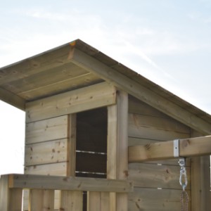 Play equipment Cabin 120 is made of pressure-treated wood