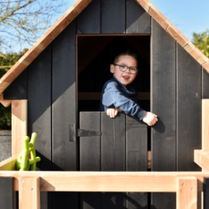 Playhouse Dream | The door can be closed with a small black latch.