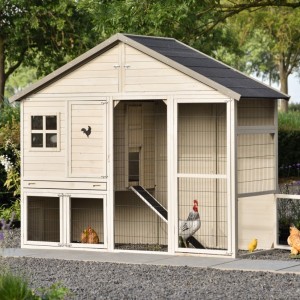 Chicken coop Holiday Large is modern, spacious, and light grey/beige in color.