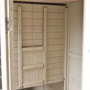The Holiday Large chicken coop has an easy-to-use closing flap.