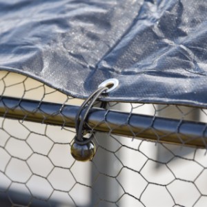 The cover is attached to the frame with elastic cords