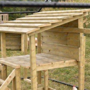 On the platform of the chicken play equipment, the chickens can relax comfortably.