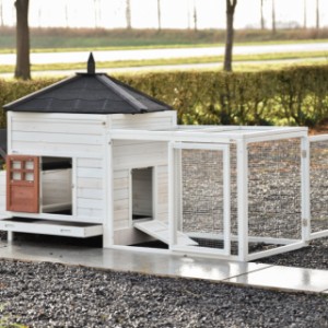 The Ambiance Large rabbit hutch with run has many doors and a removable roof