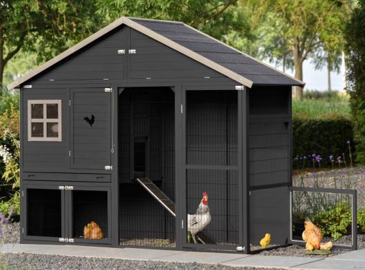 The Holiday Large chicken coop is modern, spacious, and black.