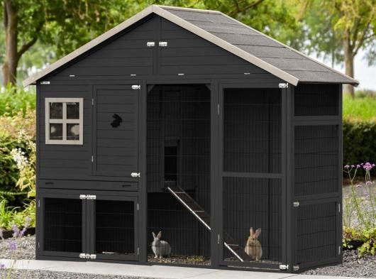 The Holiday Large rabbit hutch is modern, spacious, and black.