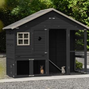 The modern look of the Holiday Large rabbit hutch fits perfectly in a contemporary garden.