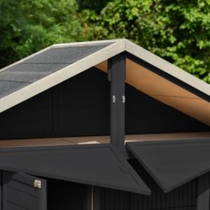 The Holiday Large rabbit hutch features a convenient storage loft under the roof, accessible from the front.