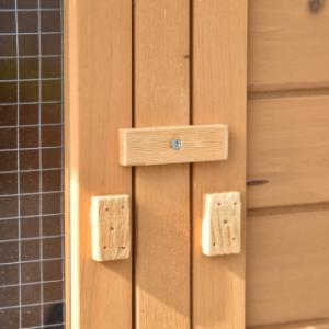 The swivel lock keeps both doors of rabbit hutch Action closed