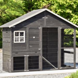 The modern look of the Holiday Large rabbit hutch fits perfectly in a contemporary garden