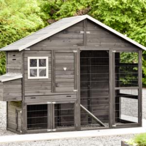 The Holiday Large chicken coop is modern, spacious, and black