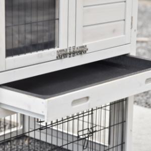The wooden hutch is provided with a plastic tray