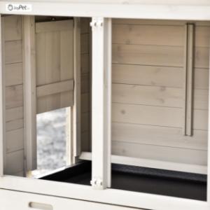 The sleeping area of the chicken coop Prestige Small is equipped with a perch