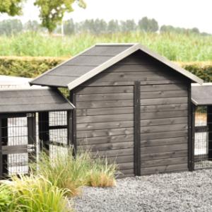 The rabbit hutch Holiday Small Black has a wooden backside