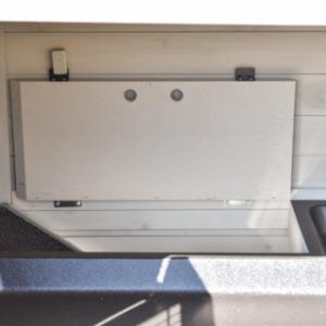 The upper floor can be locked with a hinged hatch