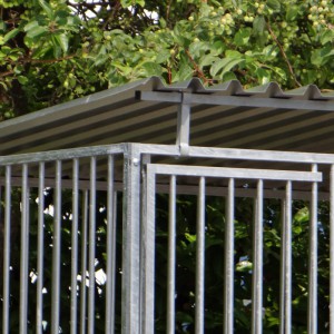 The dog kennel is provided with a roof