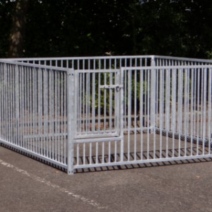 The galvanised enclosure exists of 4 panels of 2m