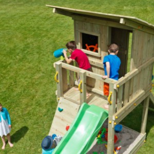 The high wooden Beach Hut play tower is supplied without a climbing wall.