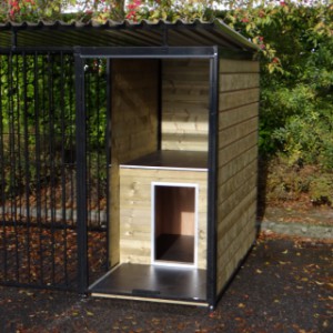 Dog kennel with integrated doghouse