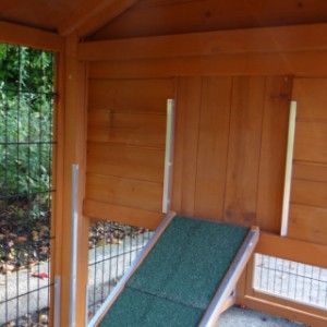 Rabbit hutch with closeable sleeping compartment